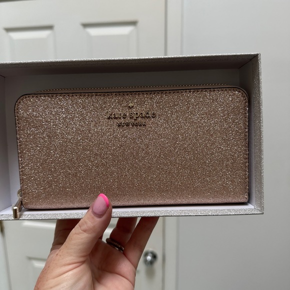 kate spade Handbags - NWT Kate Spade Rose Gold Wallet